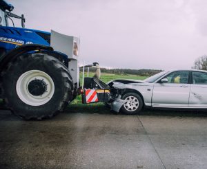 Tractor crash with front bumper shield for protection