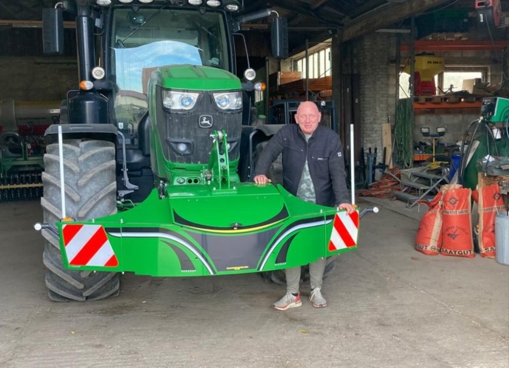 tractor bumper mounted on front of tractor